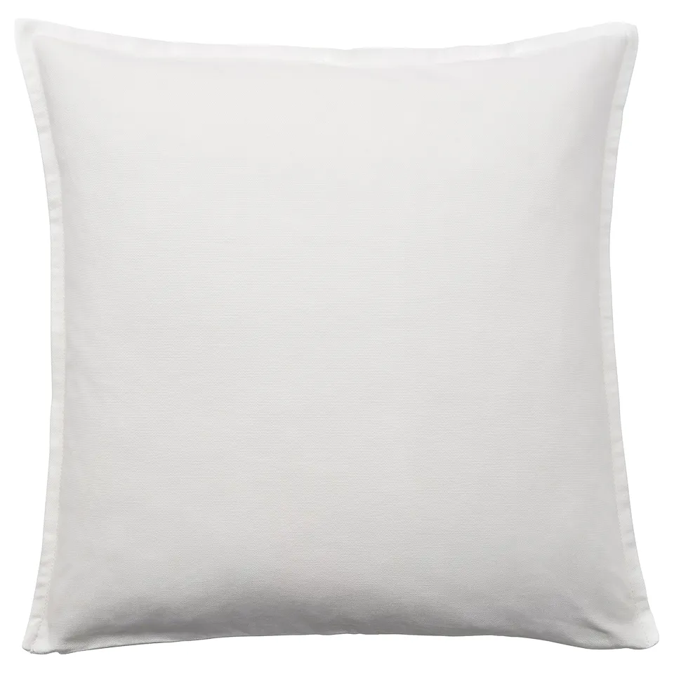 A square GURLI pillow in white, made from recycled cotton. It a zip closure with a minimalist design.