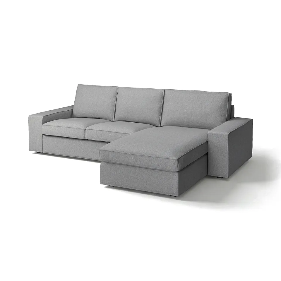 Modern grey KIVIK sectional sofa with chaise, sleek design, soft fabric.