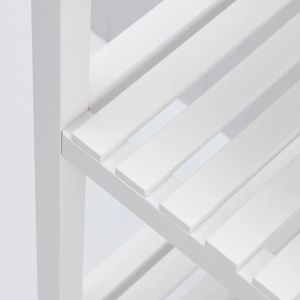Modern white open shelving unit with clean lines and multiple levels. Made from painted aspen wood. Ideal for high humidity areas.