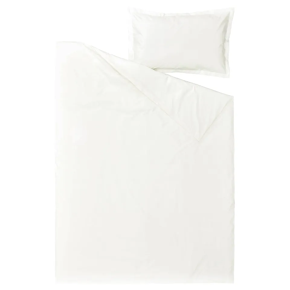 A crisp white bed linen set, including a duvet cover and pillowcase, made of 100% cotton.