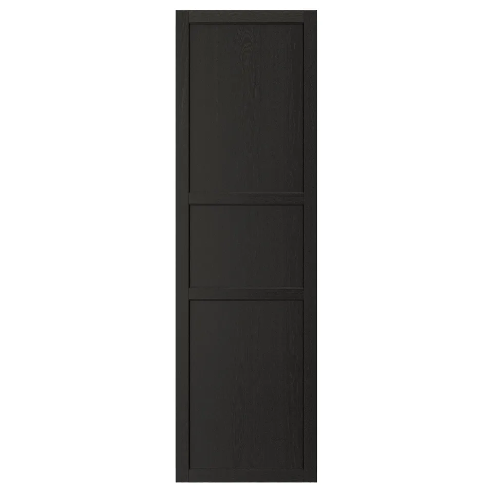 A black LERHYTTAN kitchen cabinet door with a solid wood frame and inset ash veneer panels, offering a traditional look.