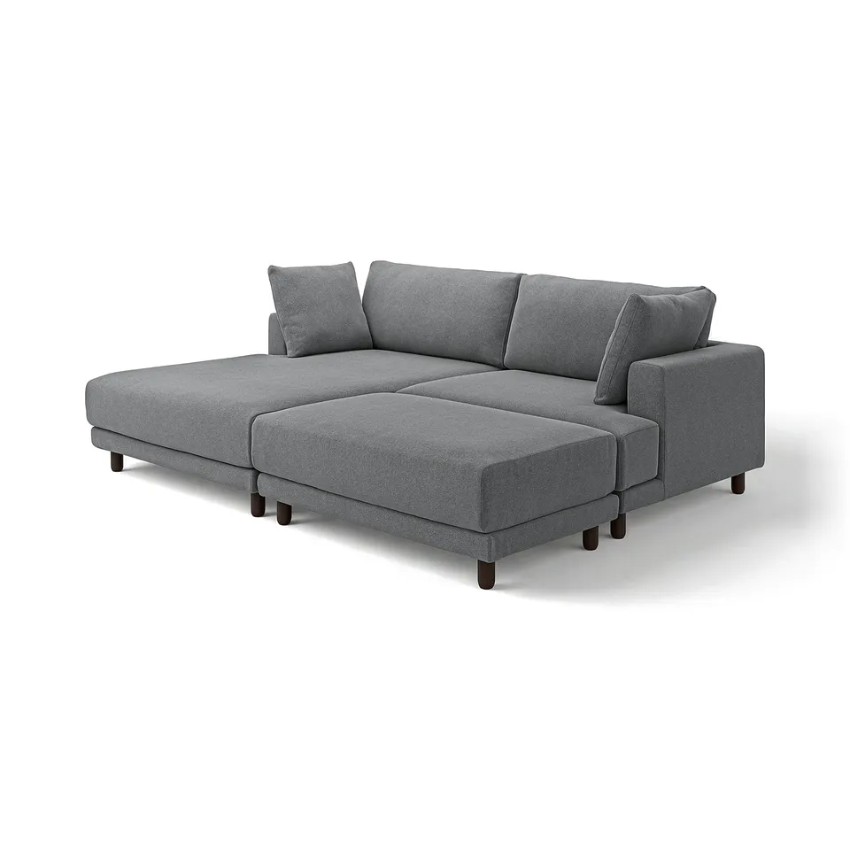 A grey UPPÅKRA modular sectional sofa with clean, modern lines. It has plush cushions and dark wooden legs, designed for comfort and easy cleaning.
