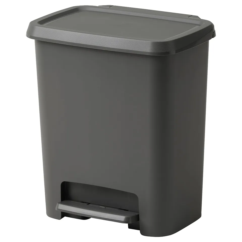 The KNÖCKLA is a sleek, grey plastic pedal bin with a rectangular shape and easy-to-clean design, suitable for waste and recycling.