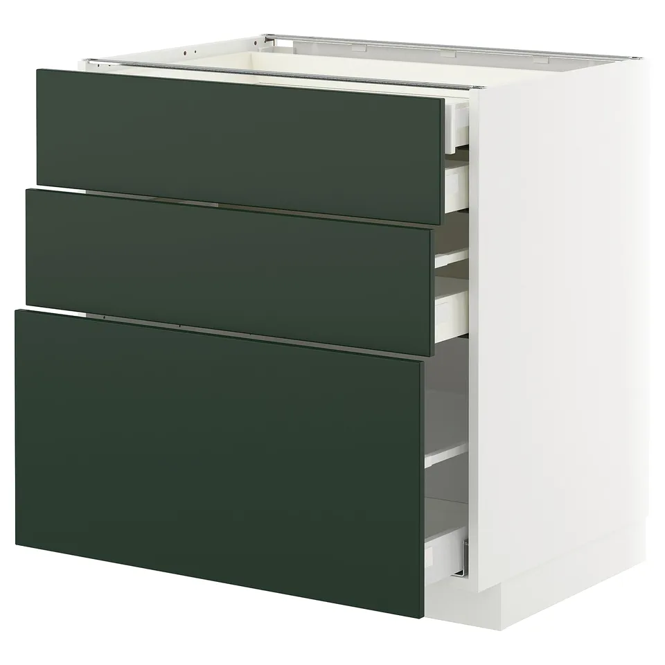 A white METOD kitchen cabinet with three green havstorp drawers. The cabinet has a sleek, modern design with smooth drawer fronts and a sturdy frame.