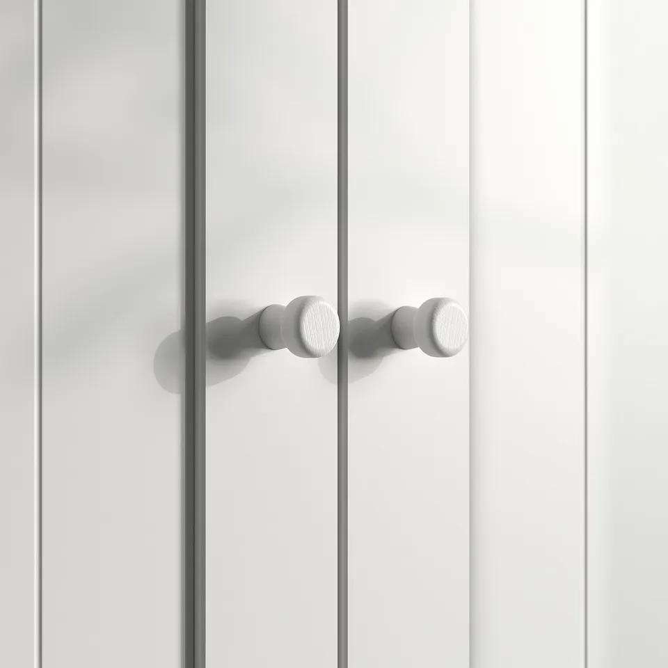 A white GULLABERG hinged cabinet door with rounded, modern handles.