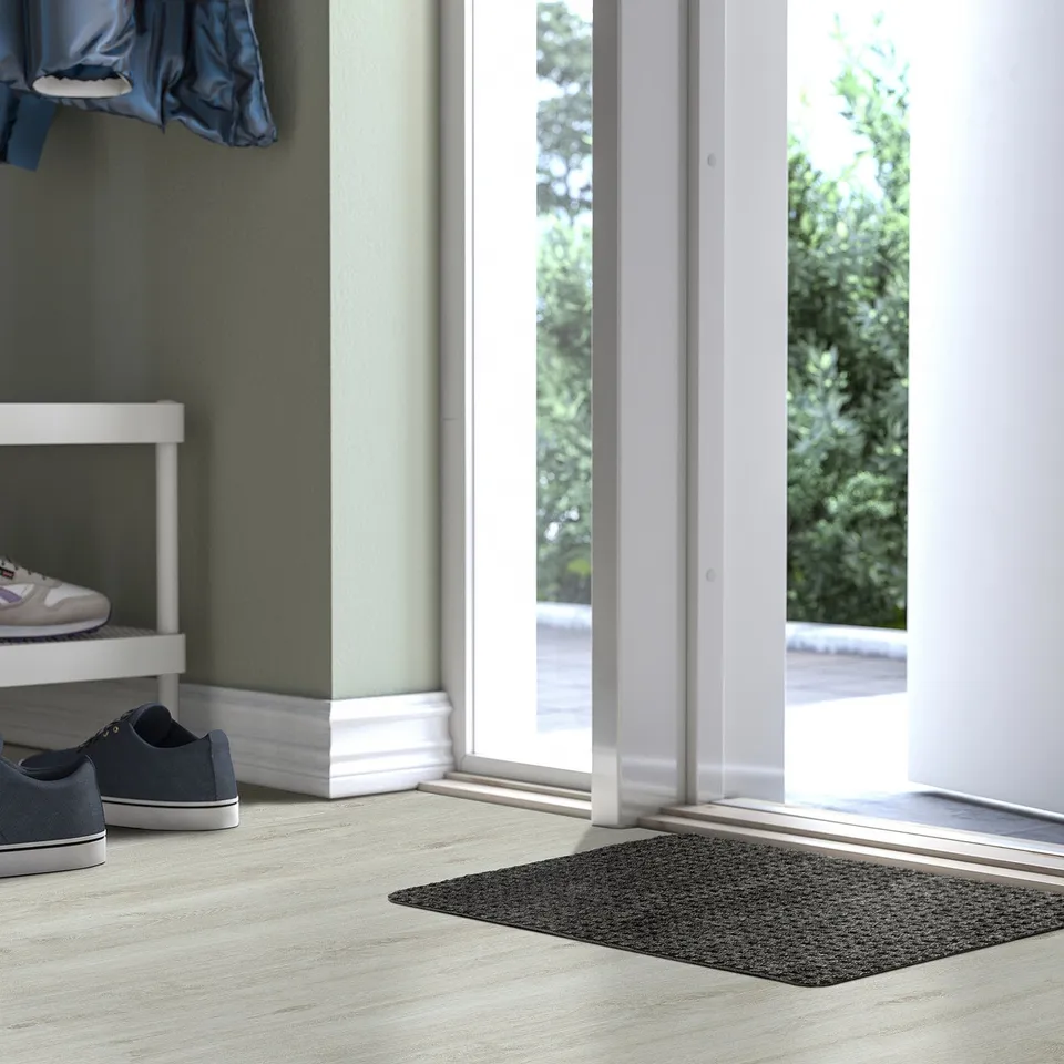 Doormat named FRIKTION, grey, rectangular, check-pattern, fits near entryway, made of polyester.
