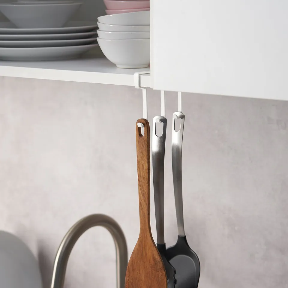 Kitchen hooks holding utensils; part of PÅLYCKE series.