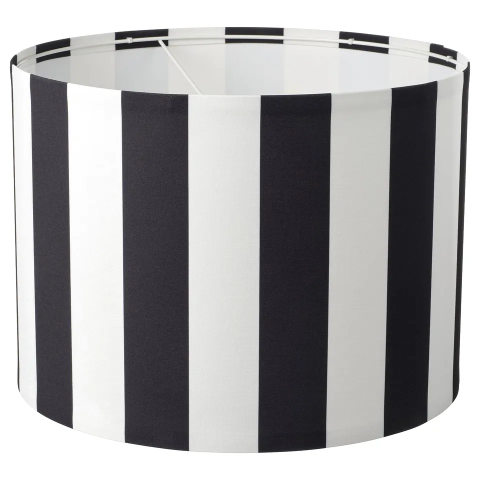 Black and white striped cylindrical RINGSTA lampshade, made from recycled polyester.