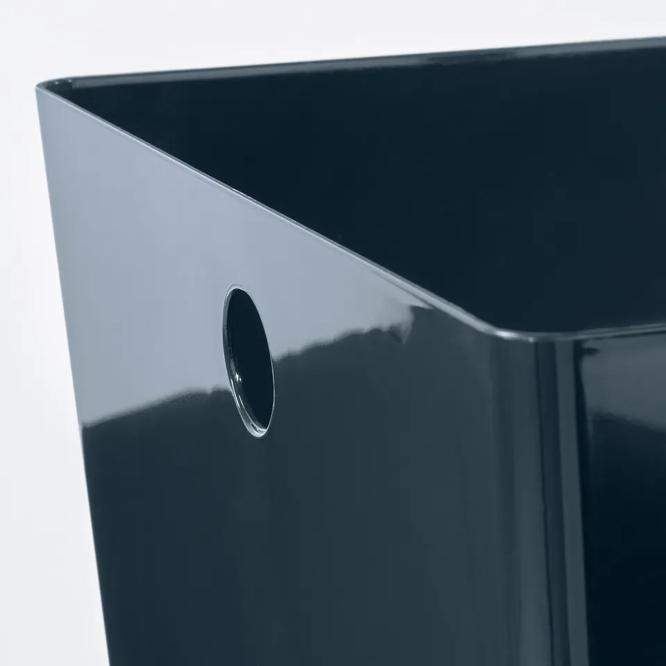 Close-up of glossy, durable plastic storage box with neat cut-out handle.