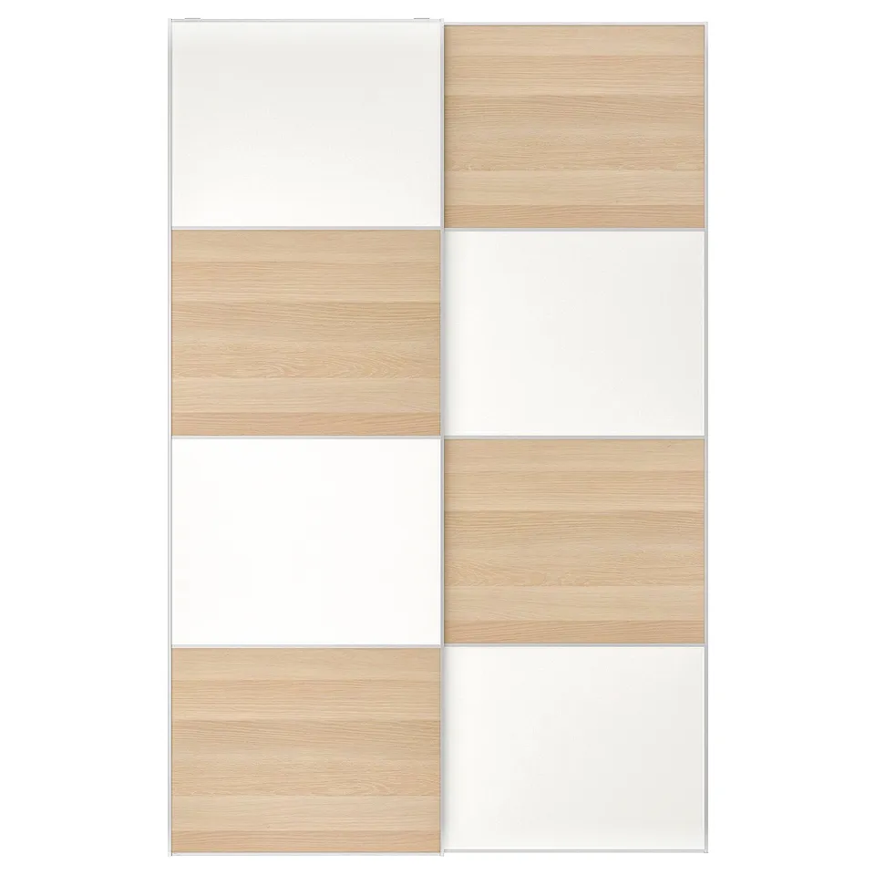 A modern, two-toned sliding closet door in white and wood grain finishes. The door a clean, rectangular design with soft-close functionality.