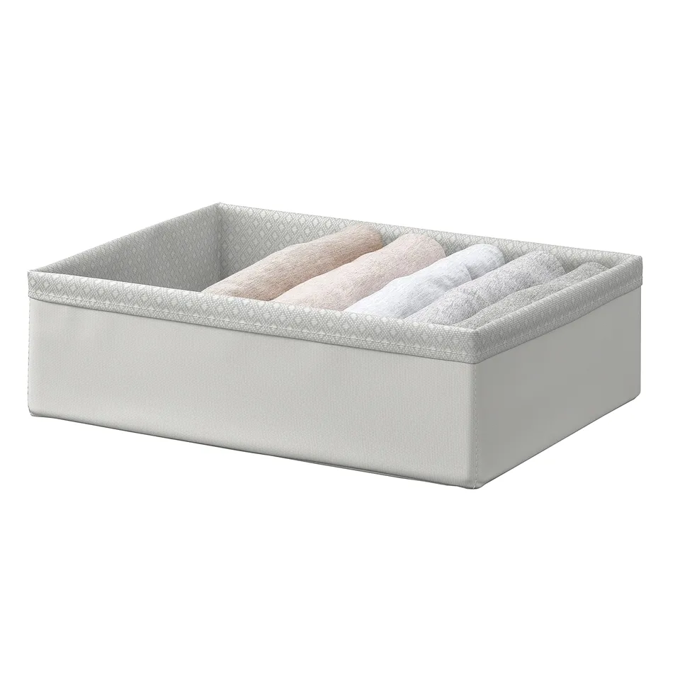 A BAXNA fabric organiser in grey made from recycled polyester. Its rectangular and designed for storing small items like underwear and accessories.