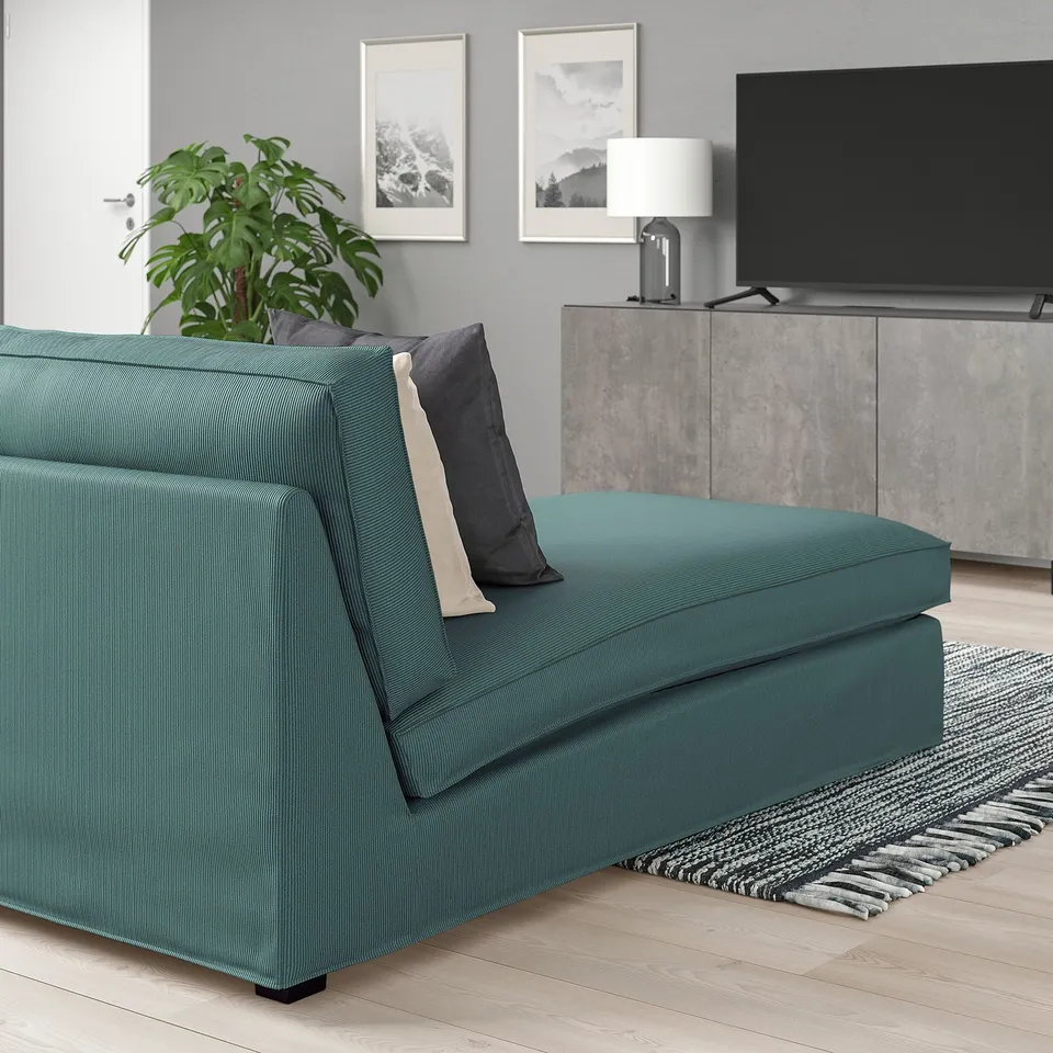 Modern living room with KIVIK green chaise; stylish, cosy, fits well near tv.