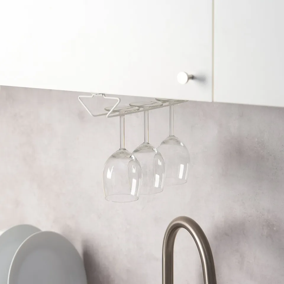 Under-shelf glass holder with three hanging wine glasses.