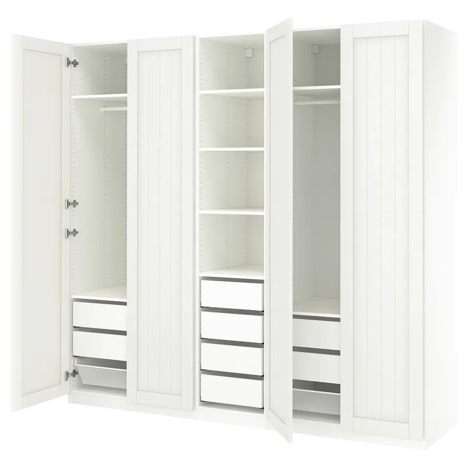 A white ikea PAX wardrobe with adjustable shelves and drawers, featuring a sleek design.