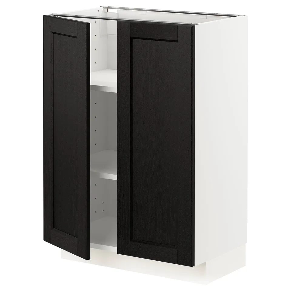 A white METOD kitchen cabinet with black stained lerhyttan doors, featuring bevelled edges and adjustable shelves.