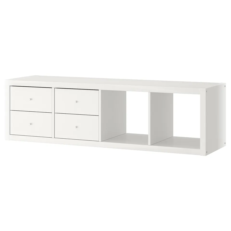 A white KALLAX shelving unit with 4 drawers and 1 open shelf, wall-mountable, modern design in particleboard and fiberboard.