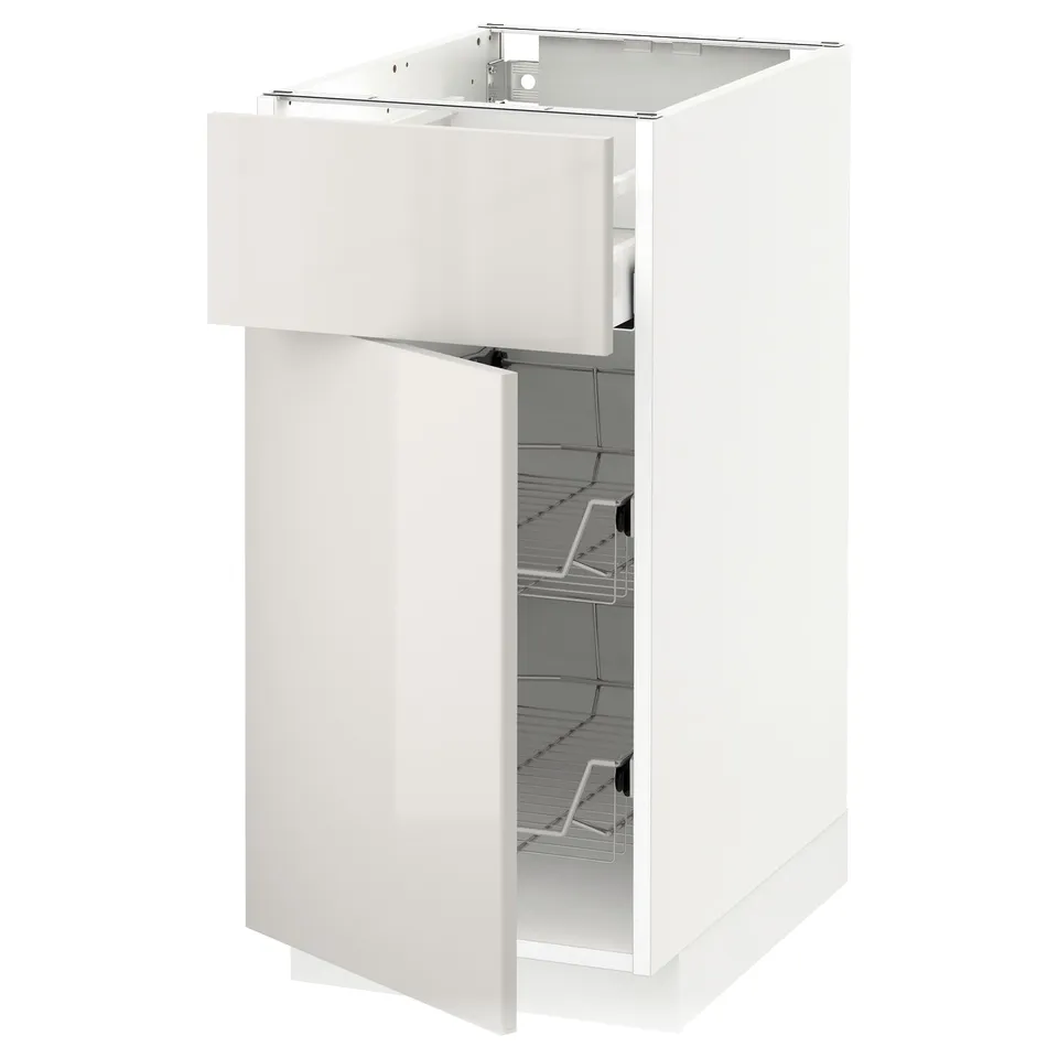 A white METOD kitchen cabinet with a high gloss finish and wire shelves.