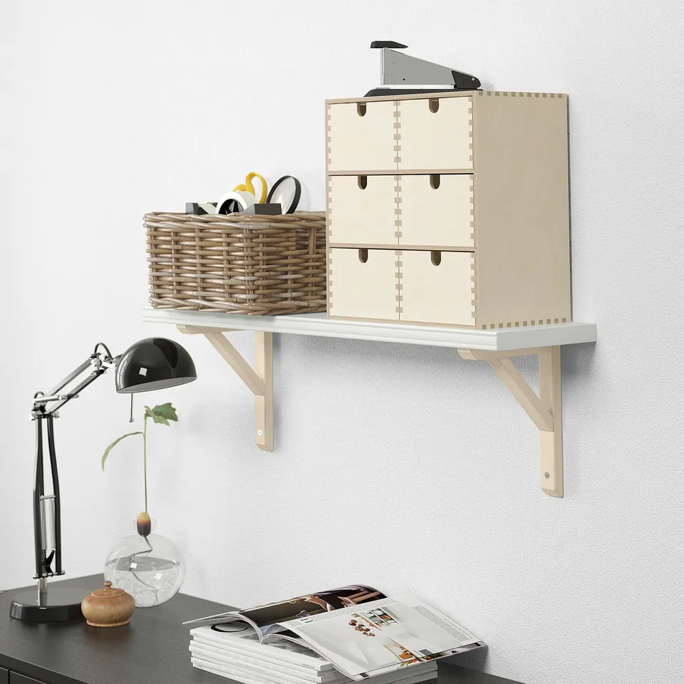 Wall-mounted BERGSHULT shelf with storage boxes and basket.
