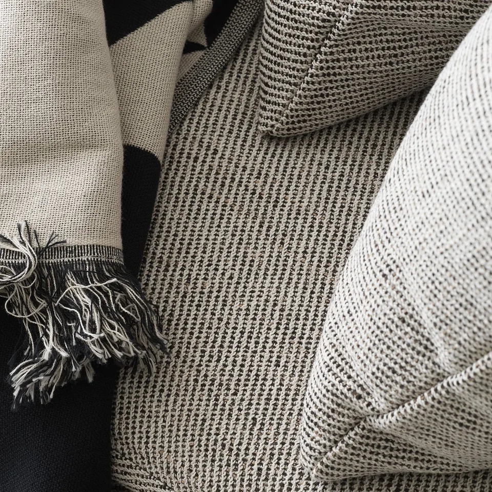 SÖDERHAMN throw, beige, knitted, folded, textured, cosy.