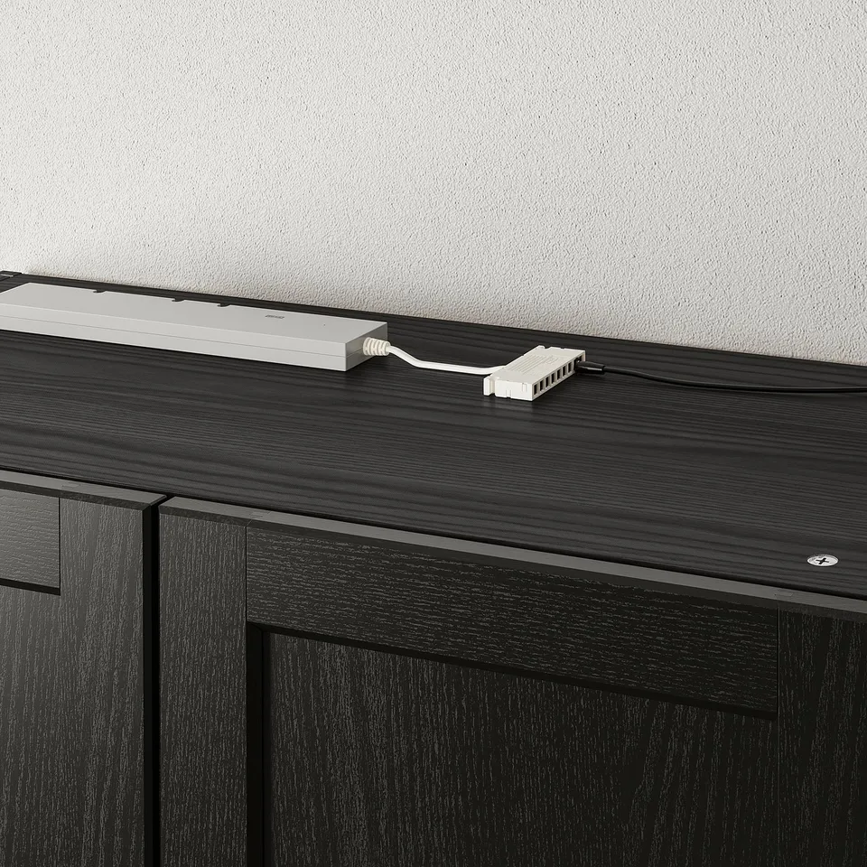 Black cabinet with led lights, remote.