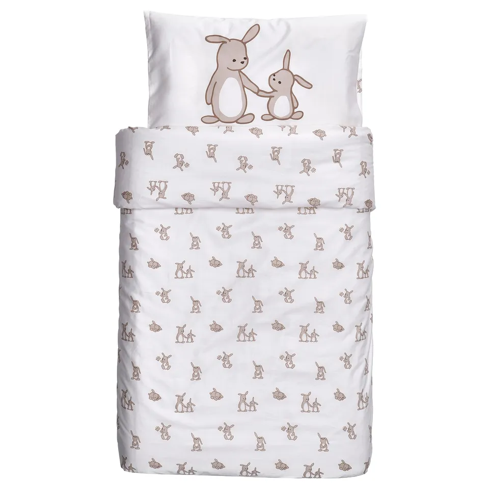 A white bedding set named LEN, featuring a cute bunny pattern. It includes a duvet cover and a pillowcase, both made with soft cotton.