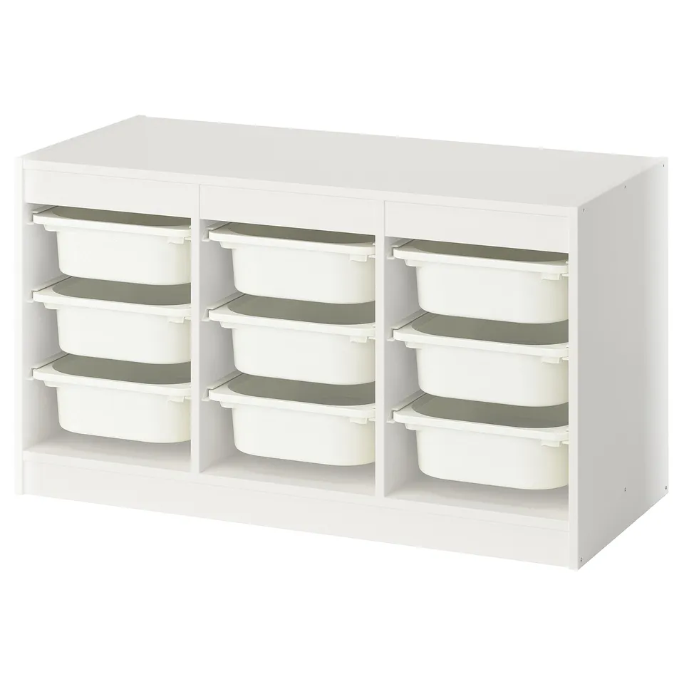 White TROFAST kids storage with green bins for toys.