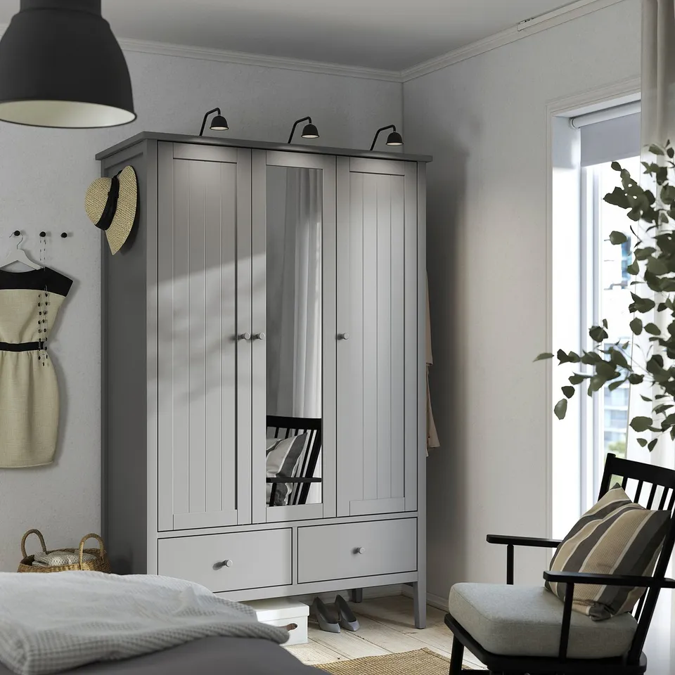 Modern grey GULLABERG wardrobe with mirror, 3 doors, and drawers. Elegant design with crafted details.