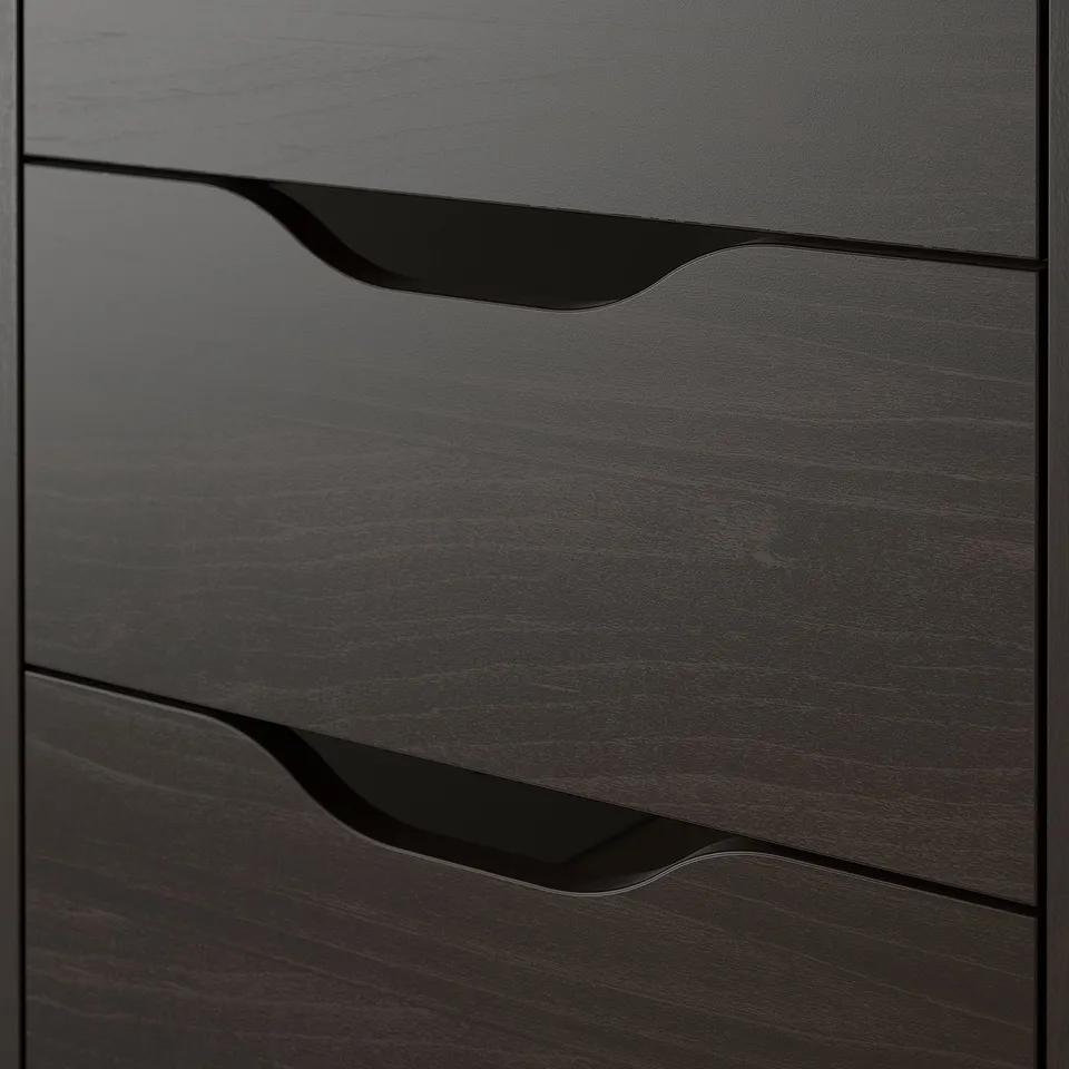Dark wooden drawer unit with three drawers, each featuring cut-out handles. Showcasing a sleek, modern design and high-quality finish.