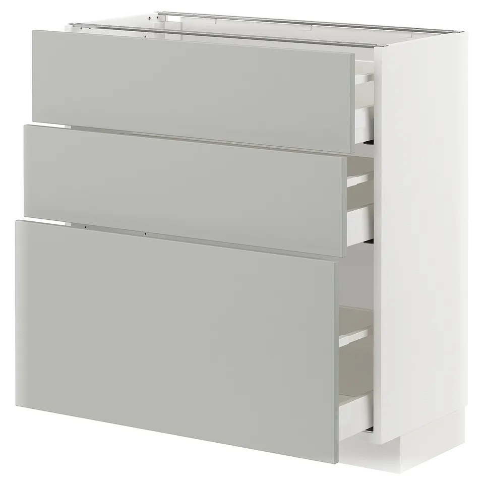 Modern kitchen cabinet, white, with multiple drawers, sleek design.