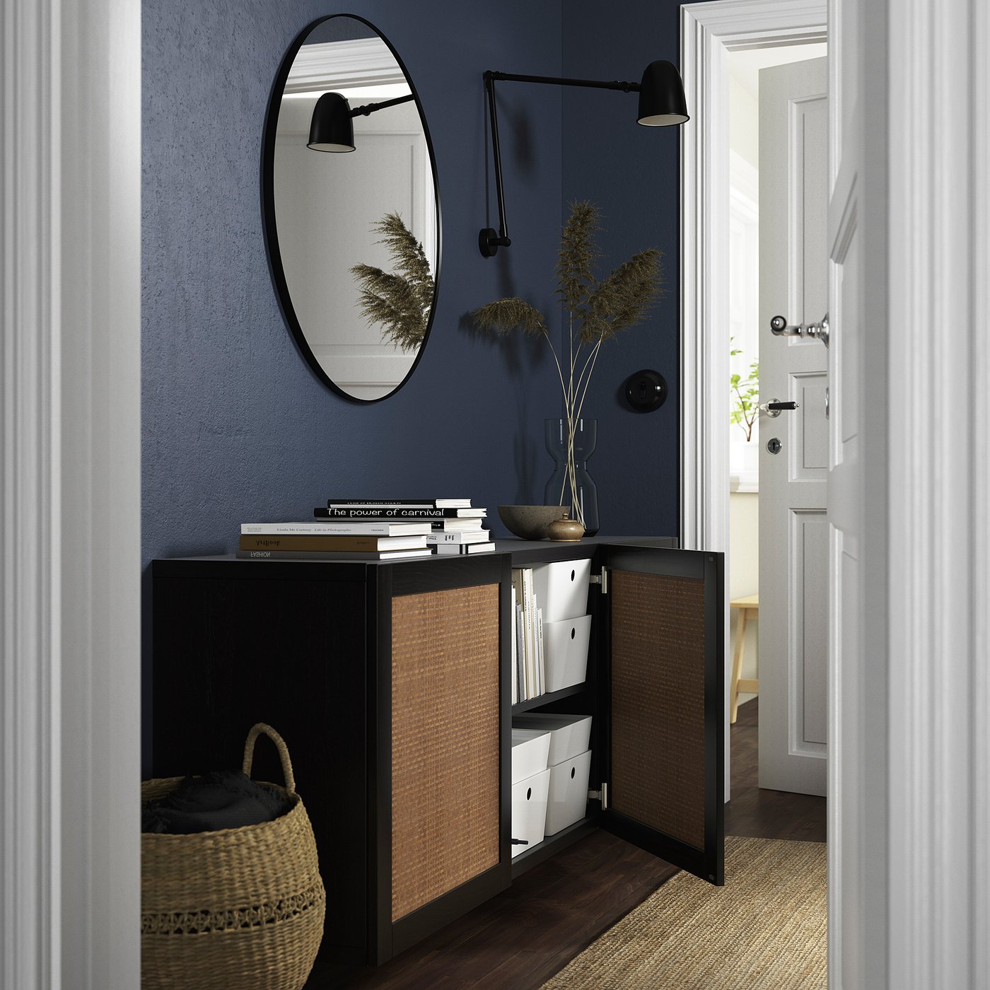 Modern entryway with open storage cabinet, mirror, and wall sconces.