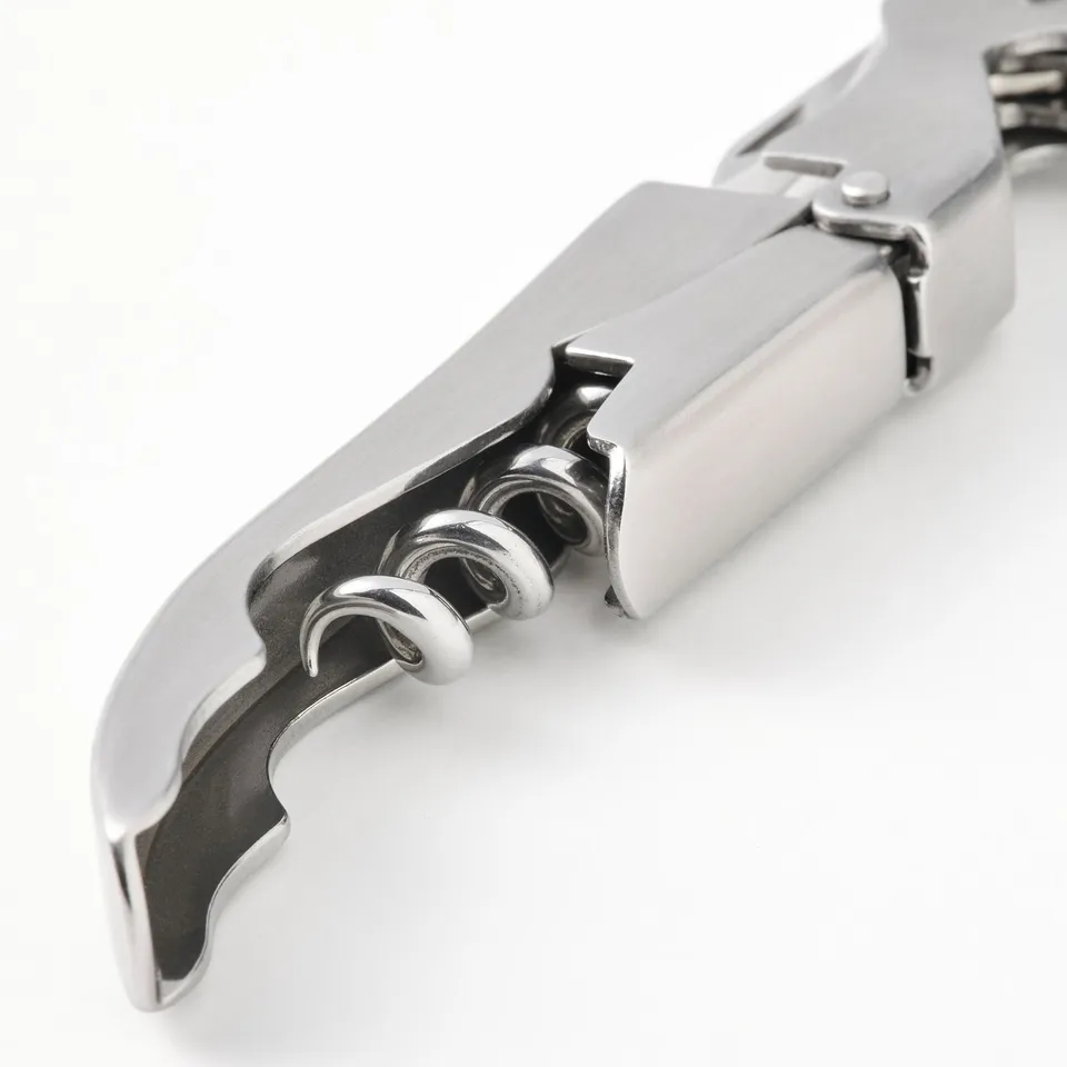 Stainless steel bottle opener with tools.