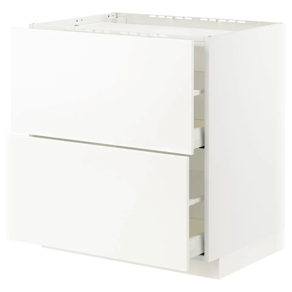 A white METOD kitchen cabinet with smooth veddinge fronts, featuring a robust frame and a high drawer.
