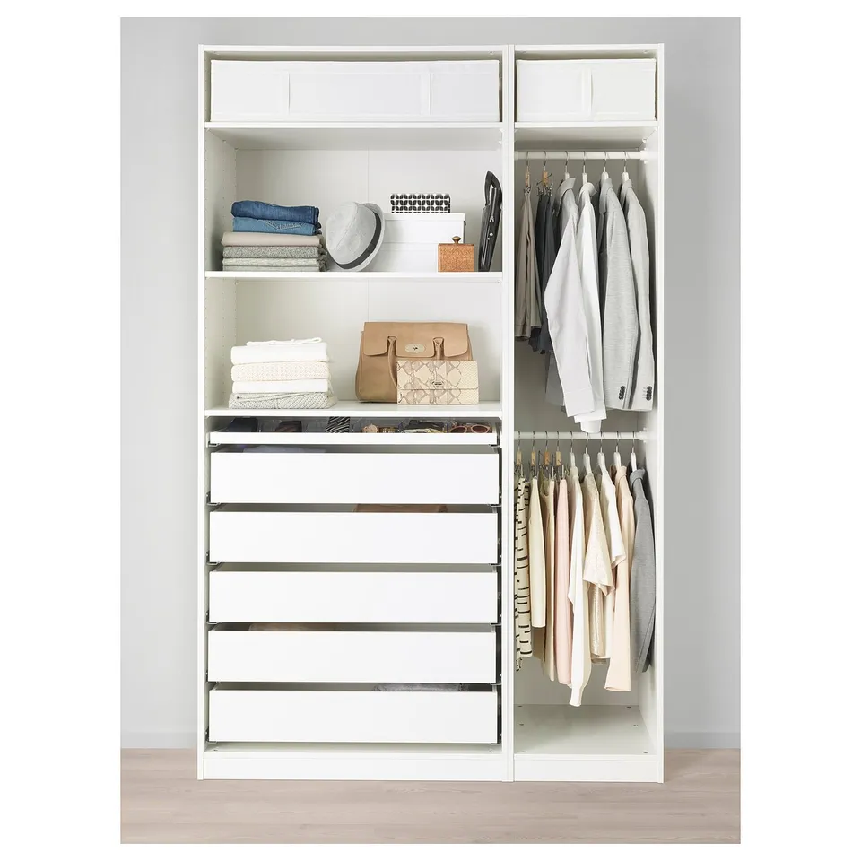 Well-organized white wardrobe with shelves, drawers, and hanging space for clothes and accessories.