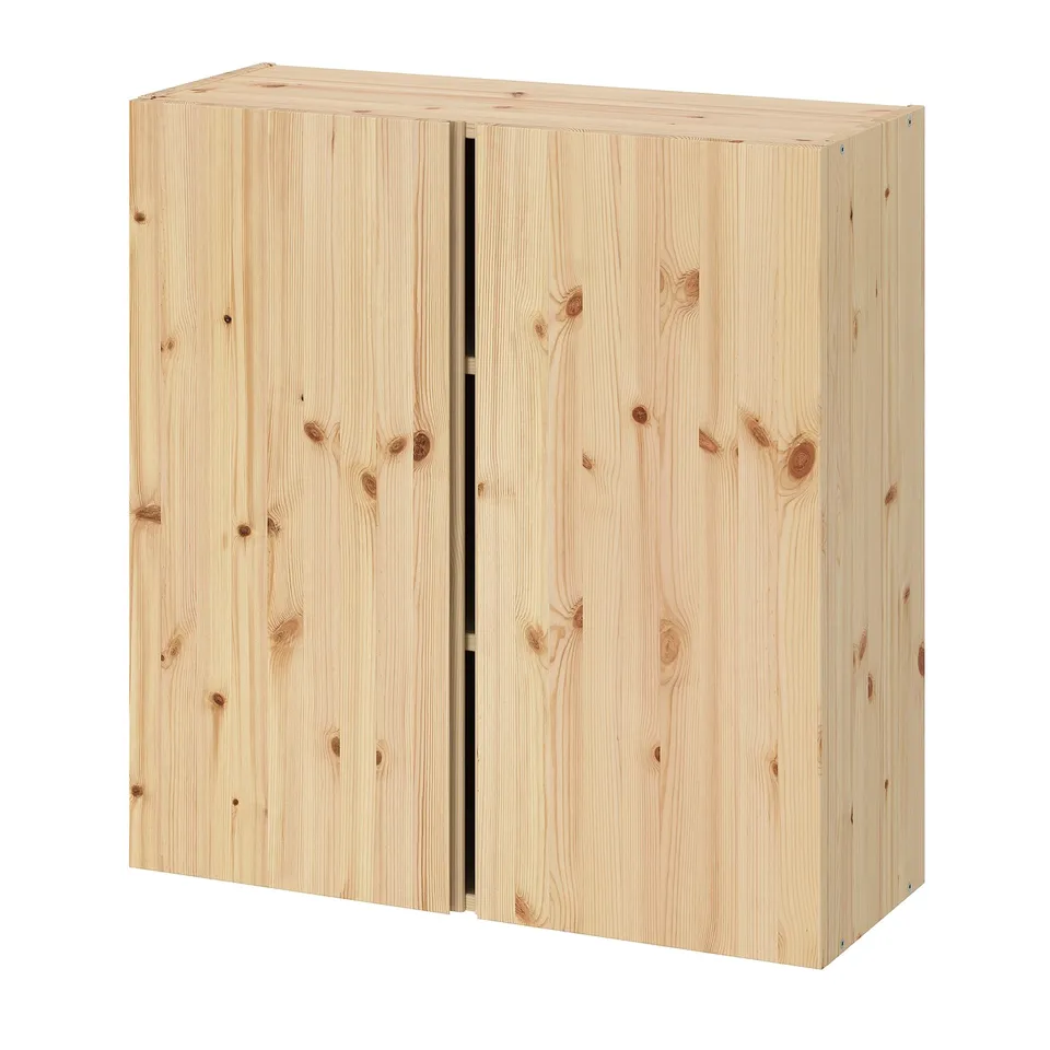 An IVAR light wood cabinet with two doors. It is a square-shaped, light brown wooden cabinet with a natural, simple design.