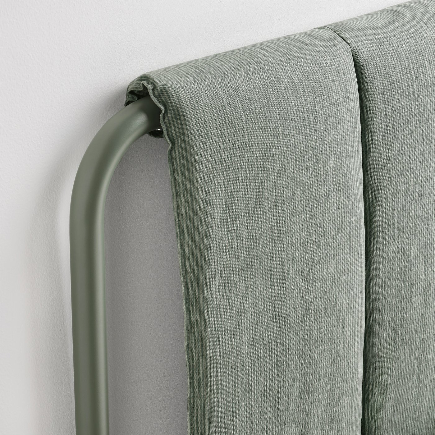 Modern bed frame with sleek lines and upholstered headboard. Grey-green striped fabric and metal accents. Quality design with clean details.