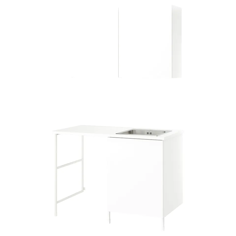 White ENHET laundry units: sink cabinet, countertop, wall cabinets. Modern, minimalist design.
