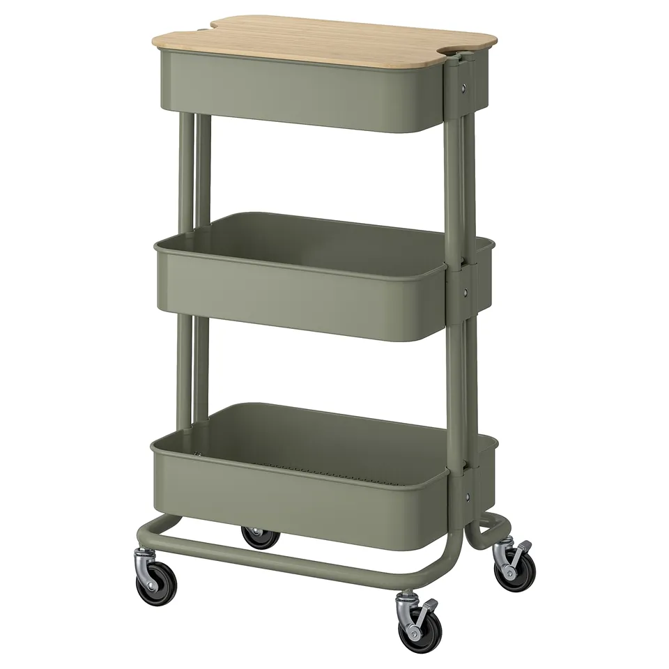 A green RÅSKOG trolley with three tiers and wooden top, on caster wheels.