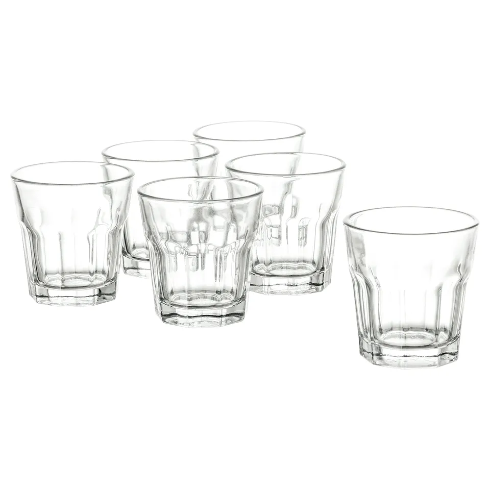 Six clear glasses with ridged design, arranged in two rows of three, perfect for various drinks.