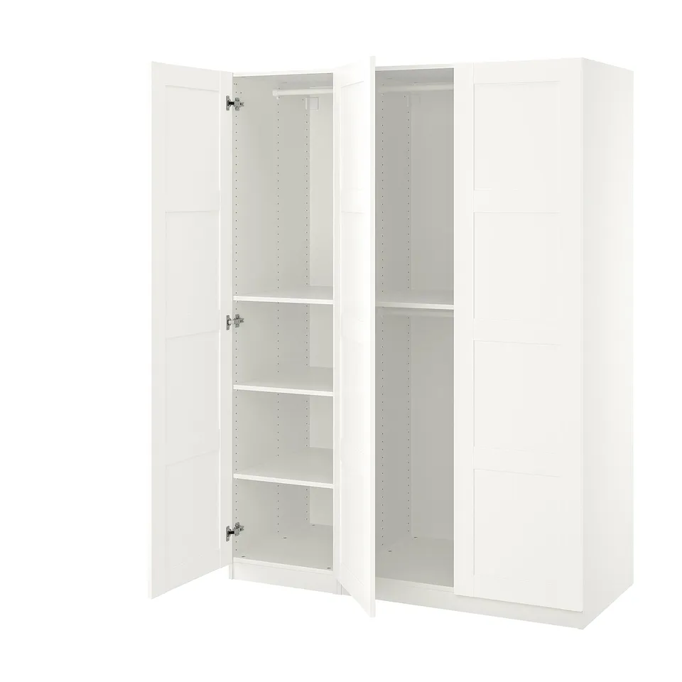White PAX wardrobe with open doors, showing shelves and hinges.