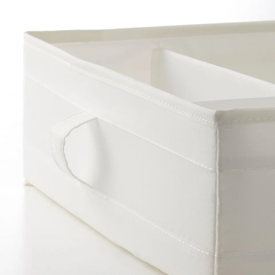 Closed white fabric box with handles, neatly folded, showcasing quality stitching and design.