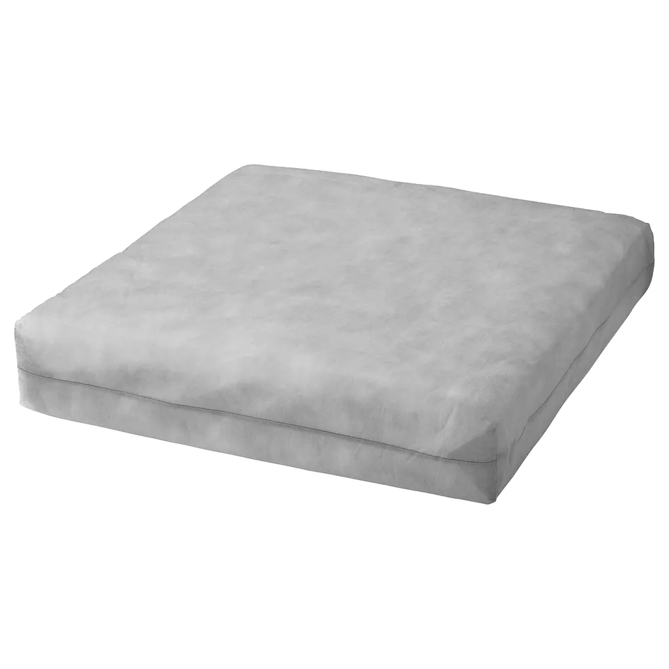 A DUVHOLMEN inner cushion, light grey, rectangular, soft and supportive. Filled with polyester, its designed for durability and comfort.