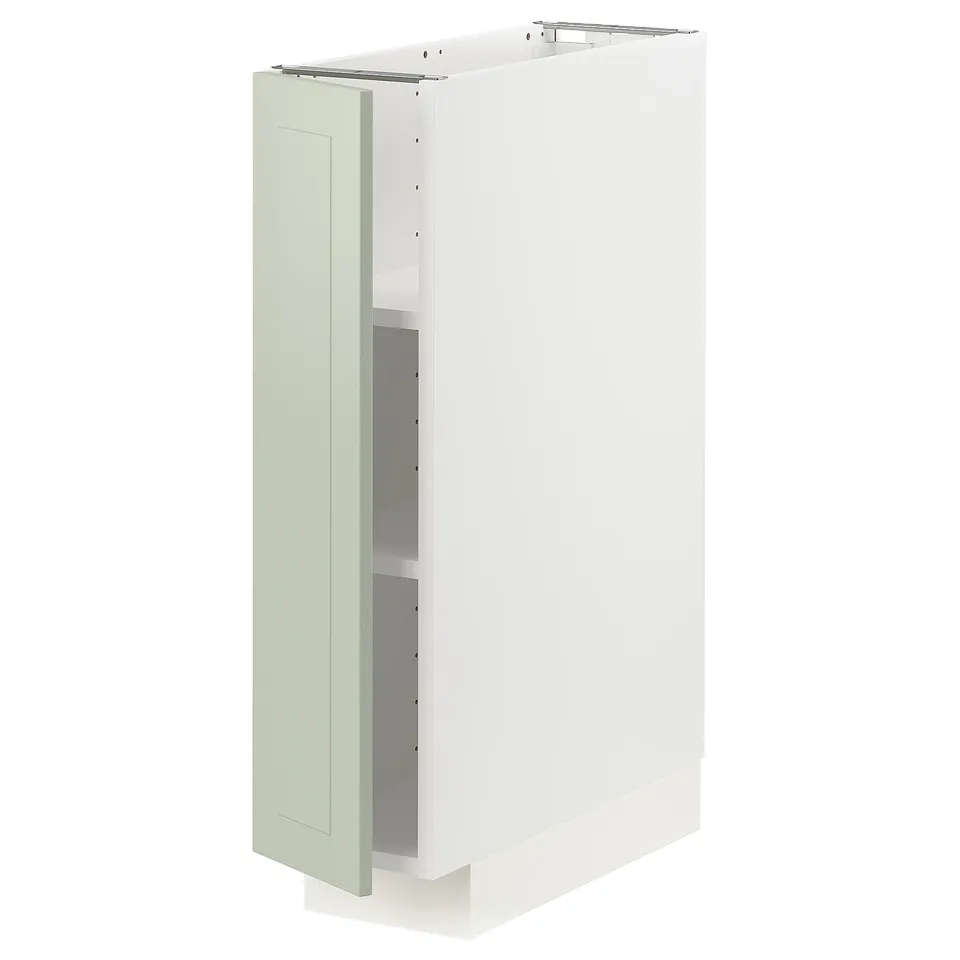 Depicts a METOD kitchen cabinet with green stensund doors and a white frame. It snap-on hinges with dampers and adjustable shelves.