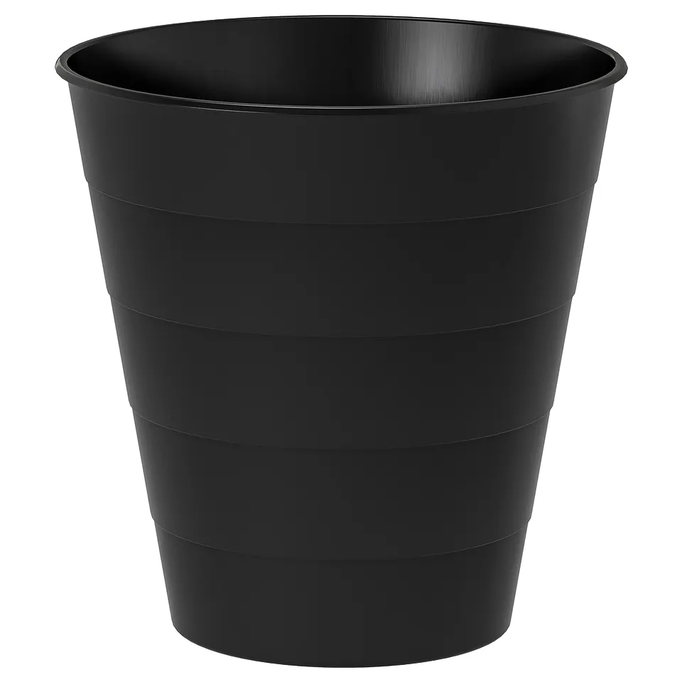 A black FNISS plastic bin. Its cylindrical with horizontal grooves and made of recycled polypropylene.