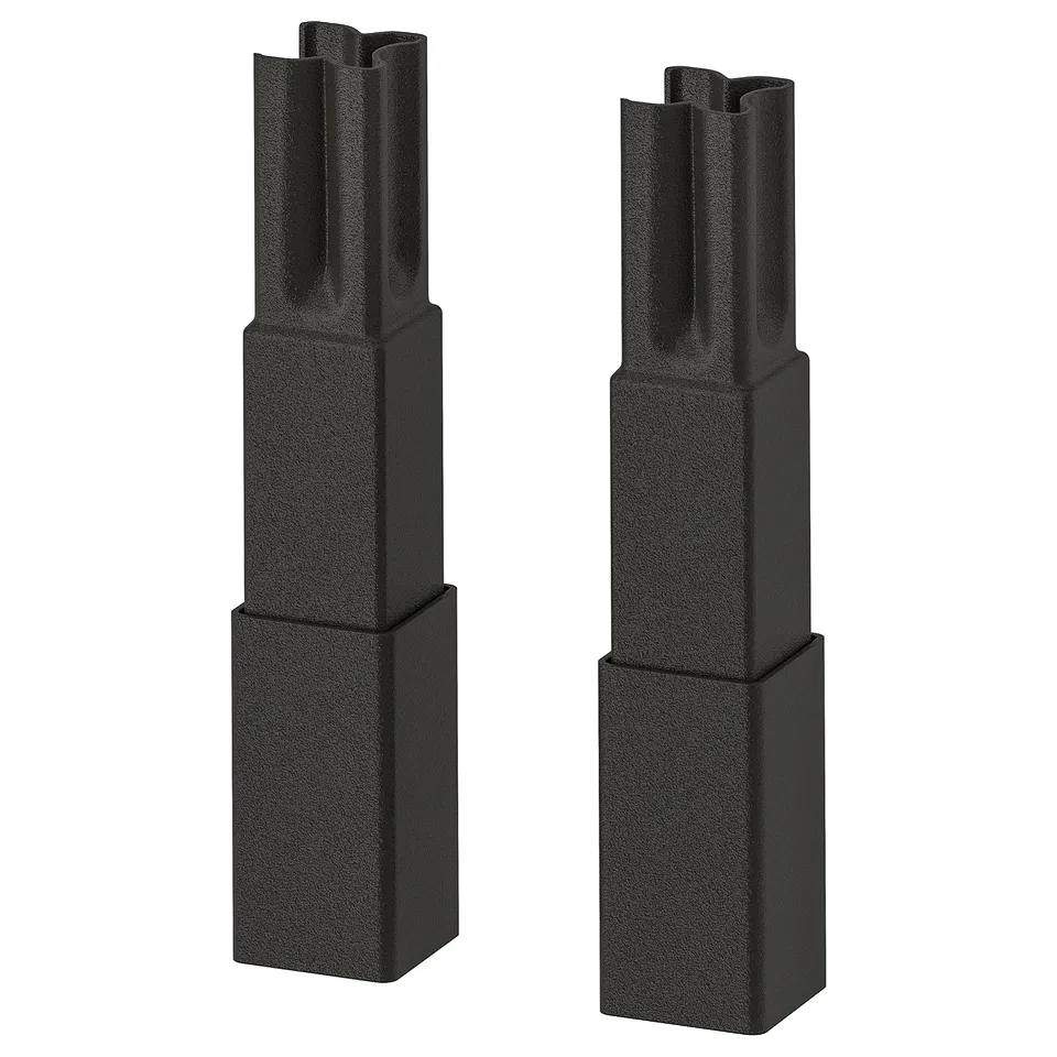 Two black ENHET kitchen legs, sleek, rectangular, with adjustable height and non-slip feet.