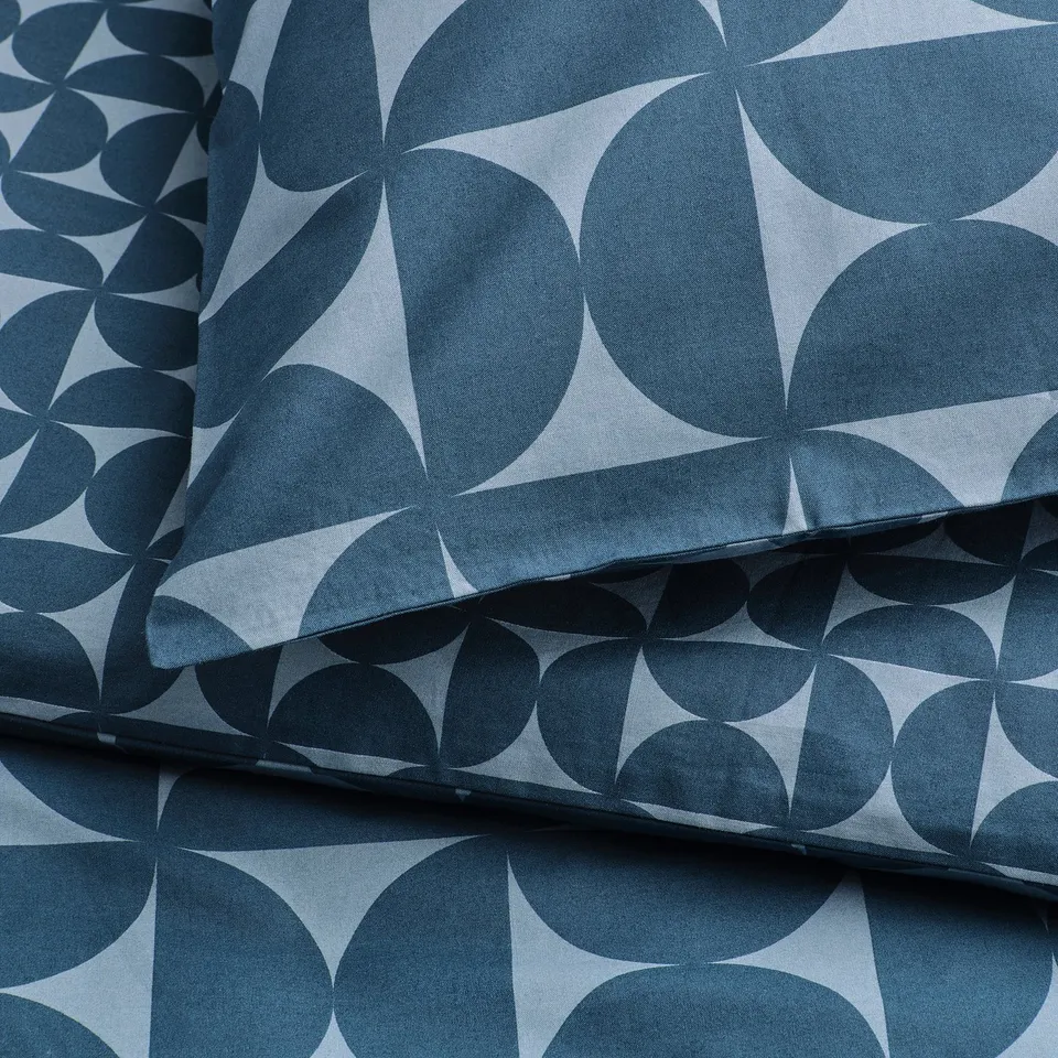 Patterned duvet set, crisp and soft, dark and light blue tones.