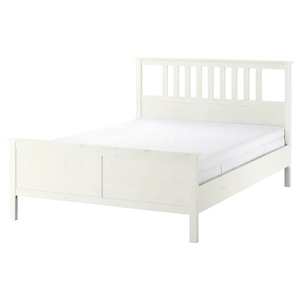 HEMNES bed in white with slatted headboard. Crafted of pine, featuring adjustable bed sides and sturdy frame.