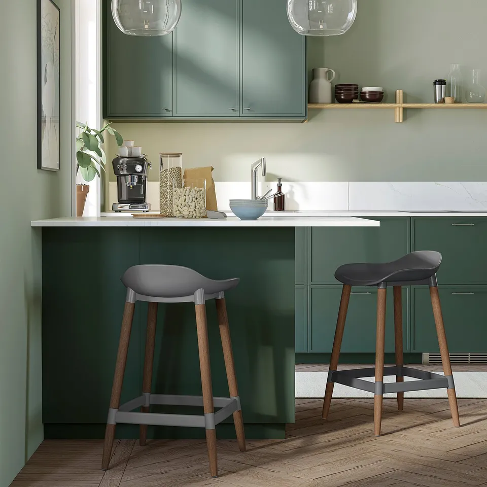 Modern kitchen with 2 green GRÖNSTA bar stools - sleek & contemporary.