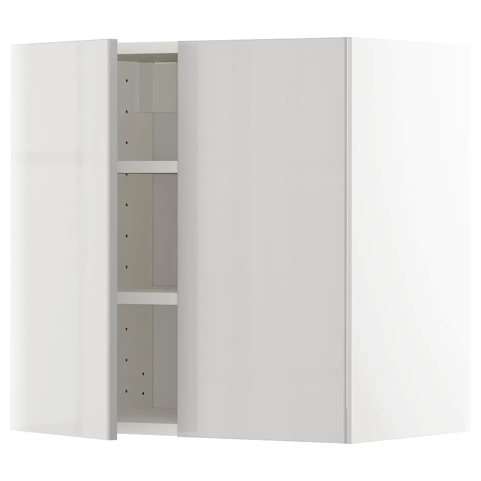 A white METOD kitchen wall cabinet with grey shelves. It has a glossy finish and adjustable shelves.