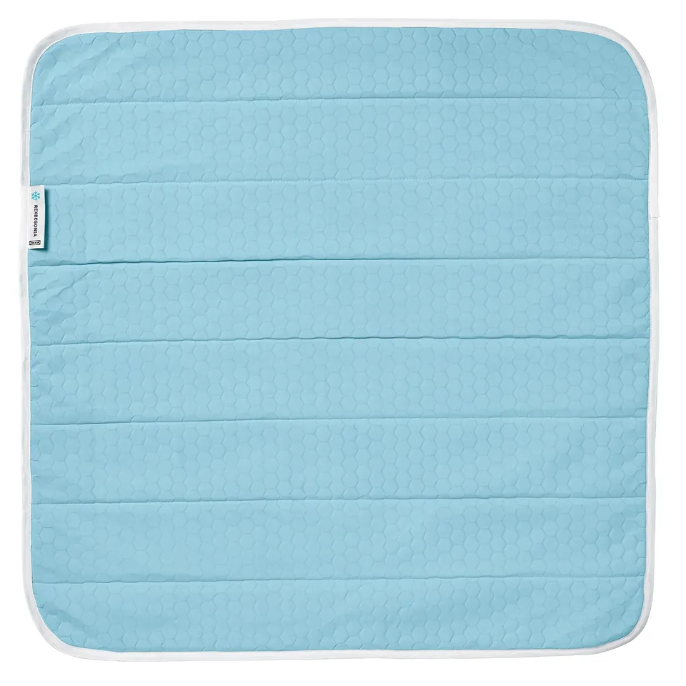 Blue rectangular cooling pad, made of recycled polyester and nylon, quilted design.