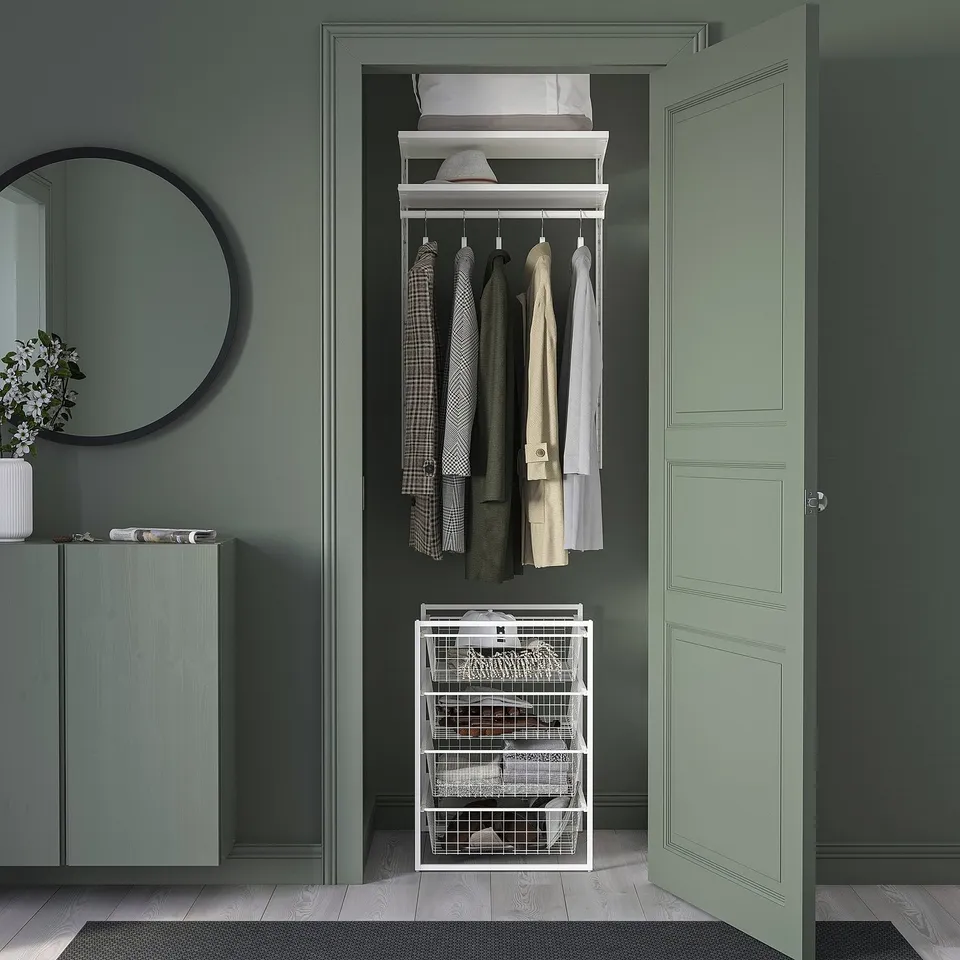 Small white JONAXEL storage organiser, metal, rectangular, fits neatly in closet, holds jackets, simple design.